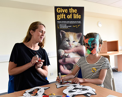 Making cat masks at Mitcham Homing Centre