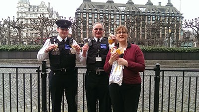 Security guards with cat-themed biscuits