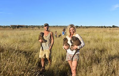 Carley Stenson and Danny Mac volunteering in Africa